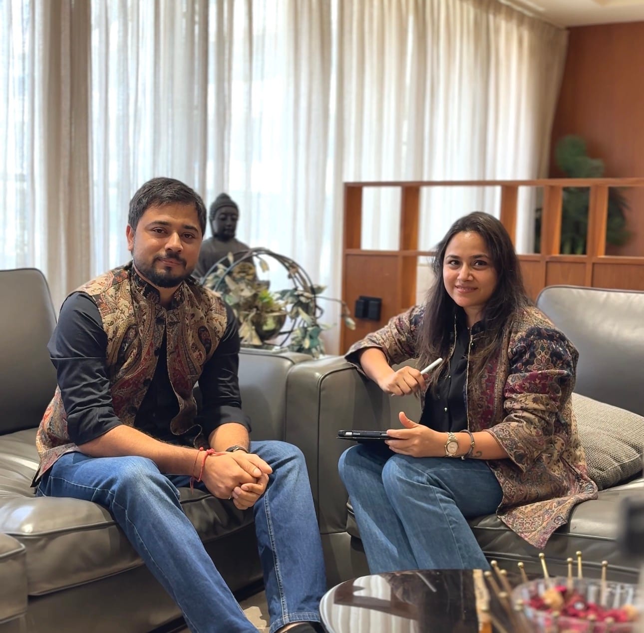 Charmi and Utsav Shah, who design and run kachche dhaage, seated in the Surat atelier
